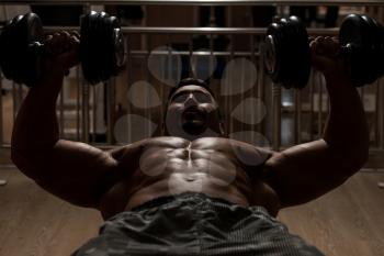Mexican Bodybuilder Working Out Chest - Dumbbell Concentration Curls