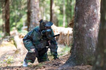 Paintball Player Hide Behind Tree