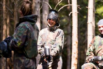 Paintball player resting and smiling