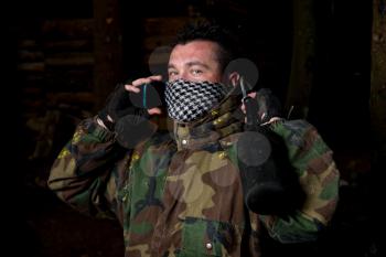 Paintball player posing for camera
