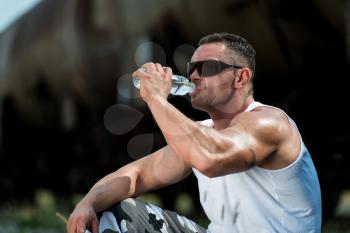 Fit Man Drinking Water