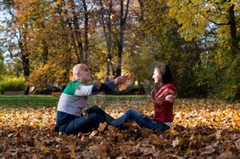 Young Couple In Autumn Park