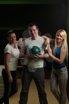 Friends Bowling Together