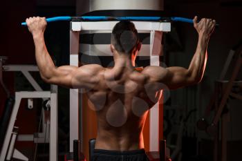 Man Working Out In A Gym