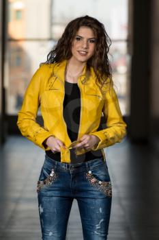 Model Wearing Yellow Leather Jacket
