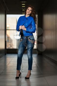 Glamour Fashion Model Wearing Blue Leather Jacket
