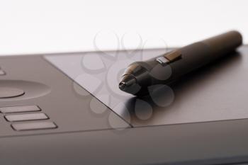 Drawing Tablet With Stylus On White Background