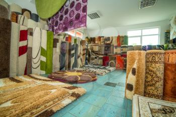 Carpets And Rugs Rolled Up & Displayed