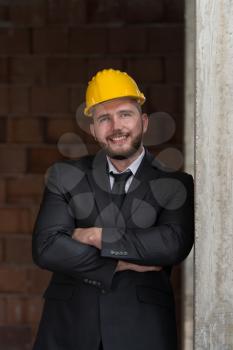 Portrait Of Young Construction Manager With Arms Crossed