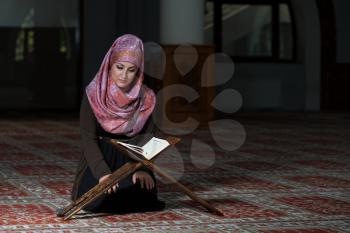 Muslim Woman Reading Holy Islamic Book Koran