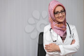 Portrait Of Smiling Muslim Female Doctor