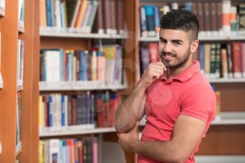 Portrait Of A College Student Man In Library - Shallow Depth Of Field