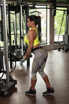 Latin Woman Athlete Doing Heavy Weight Exercise For Triceps