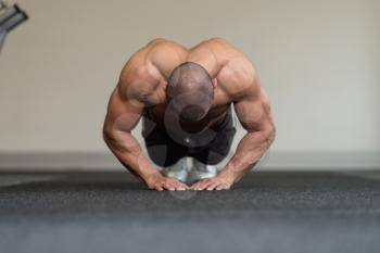 Healthy Athlete Doing Push Ups As Part Of Bodybuilding Training