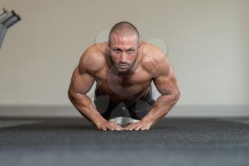 Healthy Athlete Doing Push Ups As Part Of Bodybuilding Training