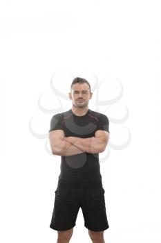Handsome Personal Trainer Wearing Sportswear Isolated On A White Background