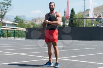 Portrait Of A Physically Fit Young Man Posing Outdoors