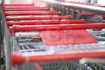 Metal Shop Carts on Blurred Background Near the Store