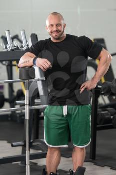 Muscular Man Resting After Exercises - Portrait Of A Physically Fit Young Man In Gym