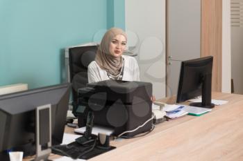 Happy Young Muslim Business Woman Work In Modern Office On Computer