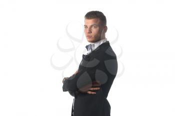 Portrait of a Young Businessman Standing Against Isolated White Background