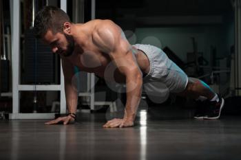 Athlete Doing Push-Up As Part Of Bodybuilding Training