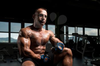 Handsome Good Looking And Attractive Mature Man With Muscular Body Relaxing In Gym