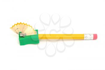  pencil sharpener with yellow pencil isolated on white background