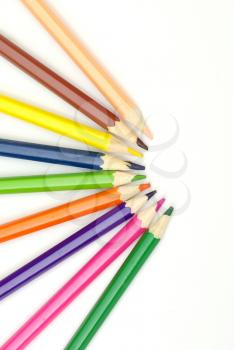 Colored pencils isolated on white background