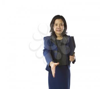 Asian women carrying folder and pen offering handshake in business suit on white background