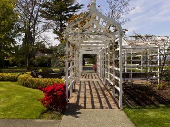 Walkway from street to capital grounds with blue sky with clouds in background