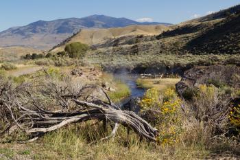 Horizontal image of natural hot springs, for bathing, near Garner River in northern part of Yellowstone National Park 