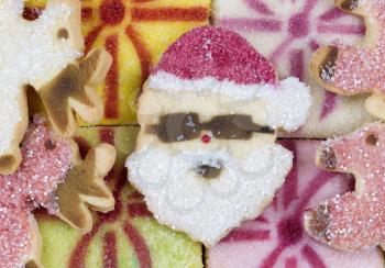 Top view close up of Christmas sugar cookies with Santa face in middle