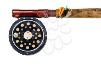 Antique fly fishing reel, flies and rod isolated on white background. 