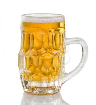 Golden colored beer in glass stein. Isolated on white with reflection. 