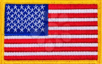 Close up USA flag with yellow trim in filled frame format. 