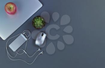 Gray desktop with mobile devices in flat lay format for telework or telecommute concept 