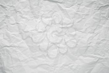Crumpled white office paper texture.