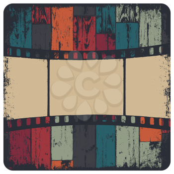 Film strip in grunge frame on colorful seamless wooden background. Vector, EPS10