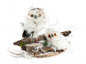 Two owls on a wooden base with snow, pine needles and snowflakes. Completely handmade.