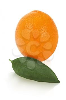 ripe orange fruit with leaves isolated on white background
