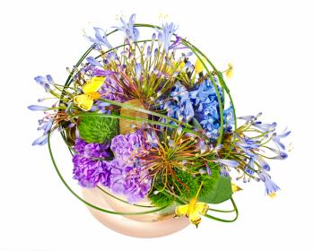 colorful floral bouquet of roses, cloves and orchids arrangement centerpiece in vase isolated on white background