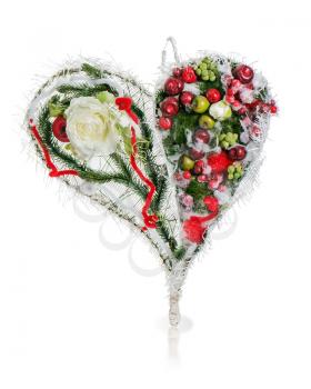 abstract composition in the form of heart from apples, balloons, roses and pine needles isolated on white background