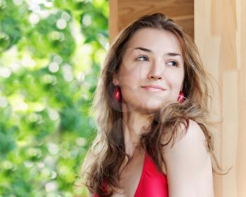 Outdoor fashion portrait of young girl. Closeup.