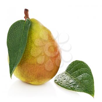Ripe pear with green leaves isolated on white background. Closeup.