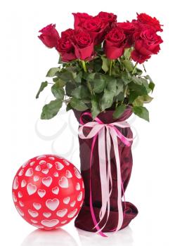 Bouquet from red roses in vase and balloon isolated on white background. Closeup.