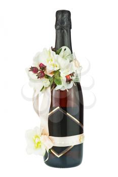 Champagne Bottle with Wedding Decoration of Flower Arrangements Isolated on White Background.