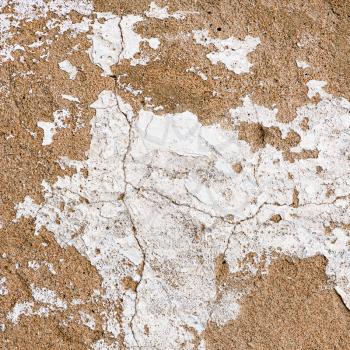 Natural plaster wall surface for texture or backgrounds. White hause wall with cracks.