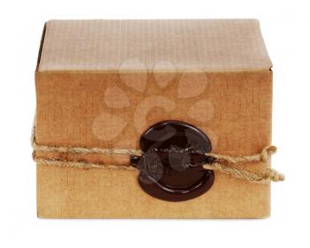 Brown cardboard box with stamp isolated on white backgroun.