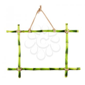 Green bamboo frame isolated on white background. Closeup.